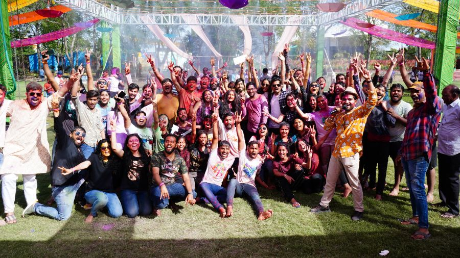 Company team celebrating Holi together on the Simcha Island lawns